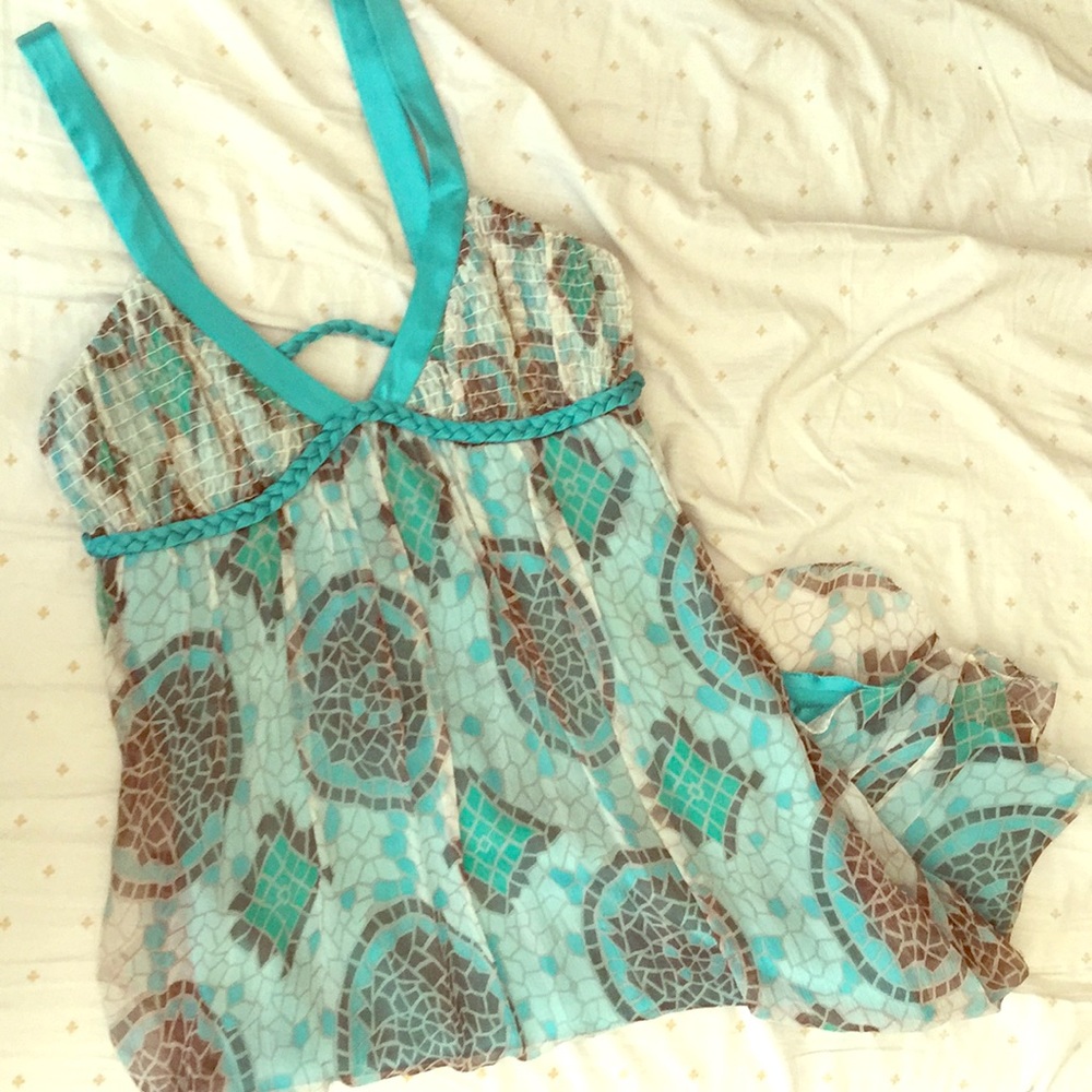 Turquoise dress with braid detail